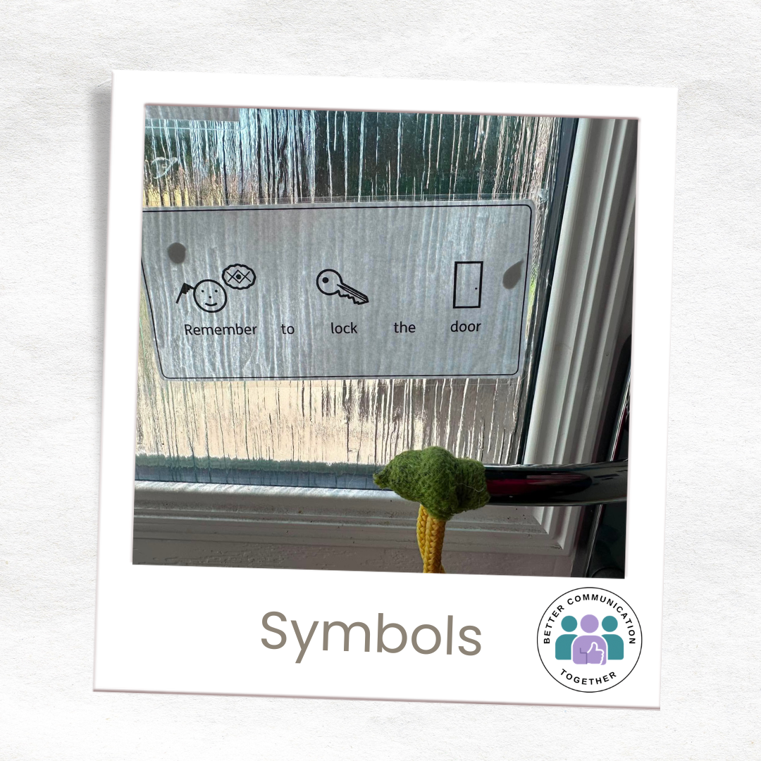  Symbol-supported reminder by a door saying &ldquo;Remember to lock the door&rdquo;.